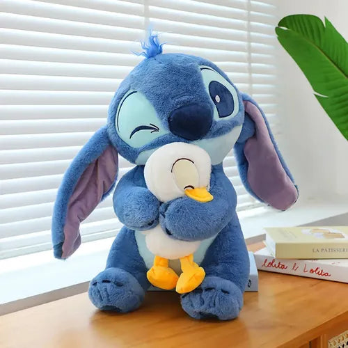 PELUCHE STITCH CON SU PATO DE 40 CM 😍