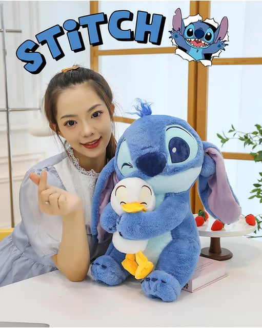 PELUCHE STITCH CON SU PATO DE 40 CM 😍