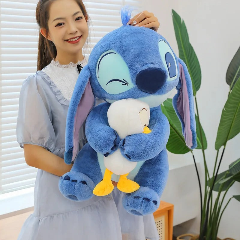 PELUCHE STITCH CON SU PATO DE 40 CM 😍
